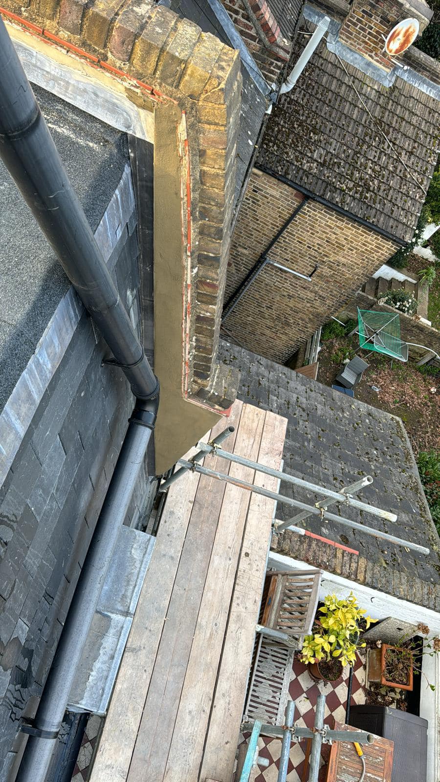 Professional roofers working on a property in London - KS Roof Master