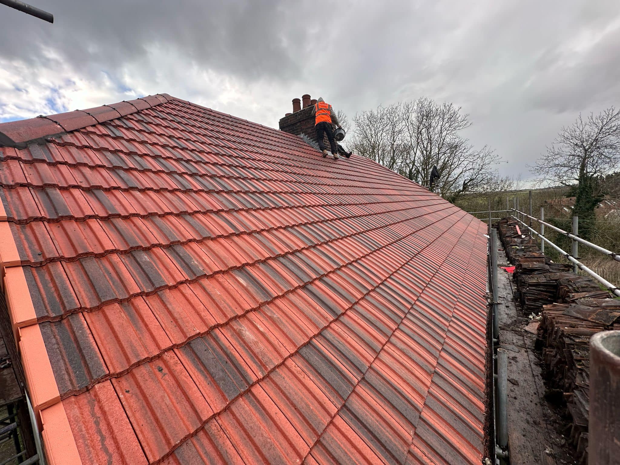 Professional roofers working on a property in London - KS Roof Master