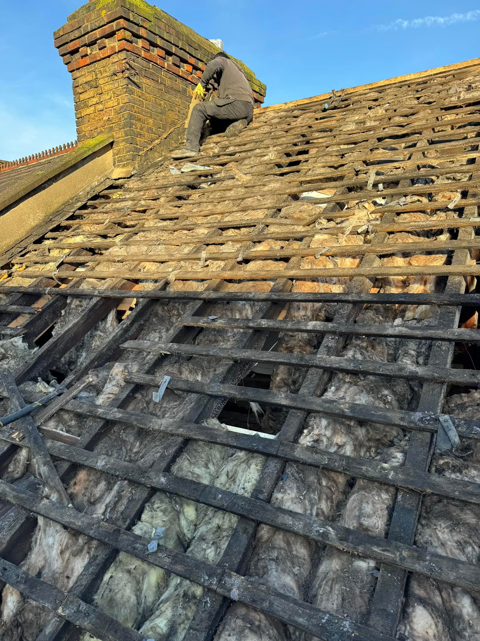 Professional roofers working on a property in London - KS Roof Master