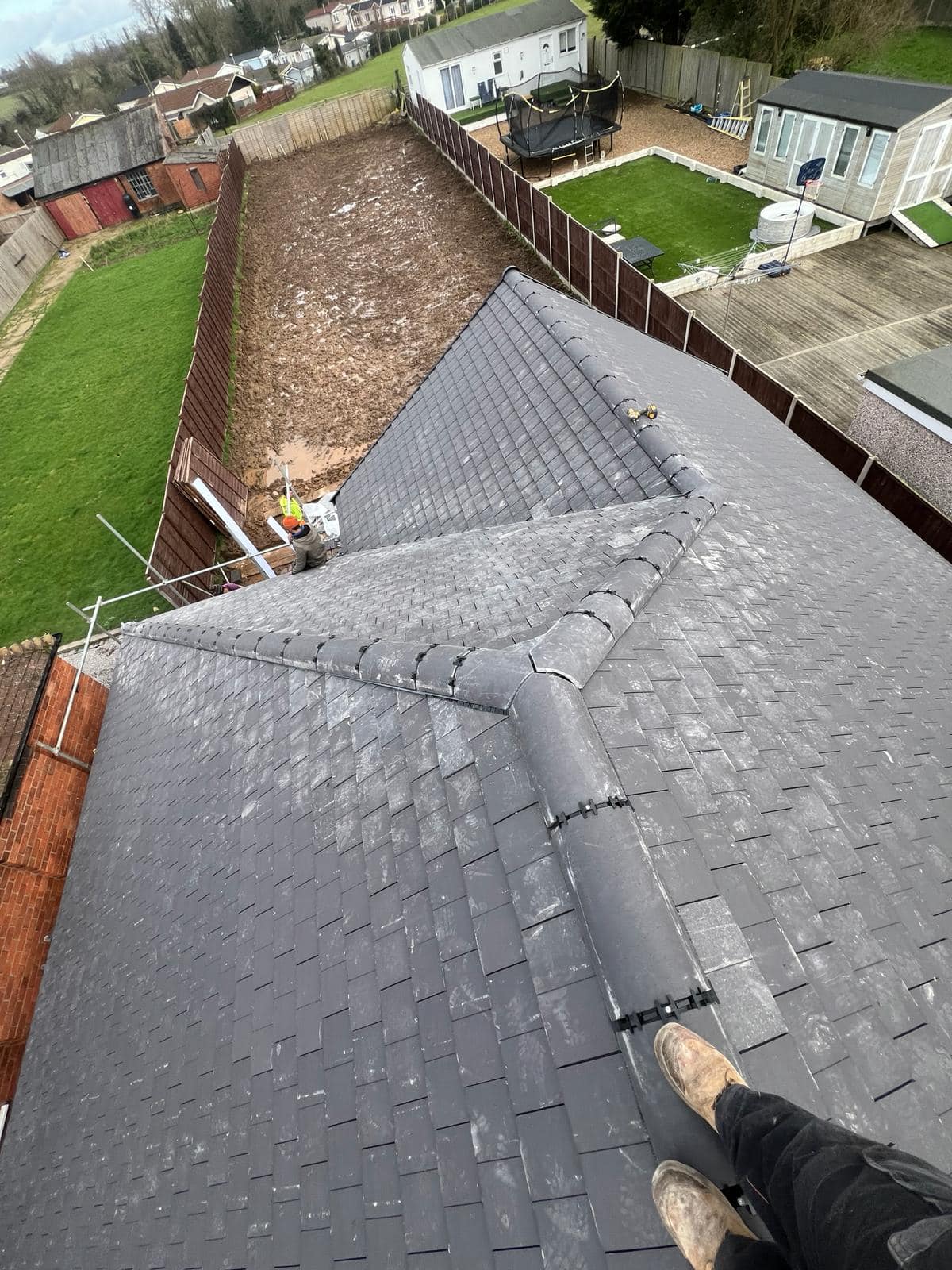 Professional roofers working on a property in London - KS Roof Master