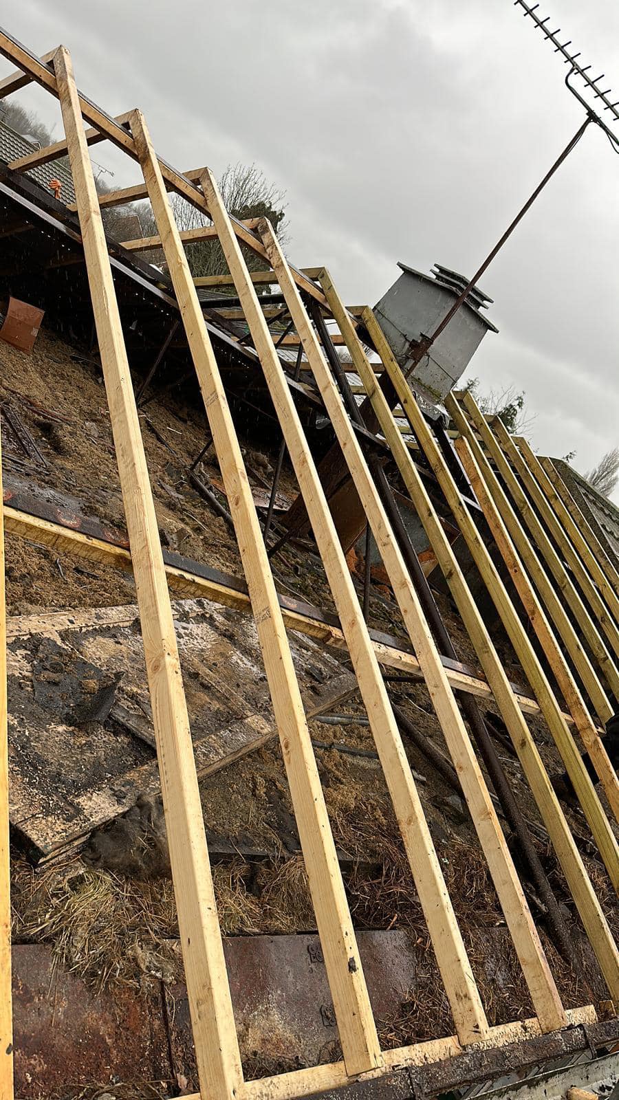 Professional roofers working on a property in London - KS Roof Master