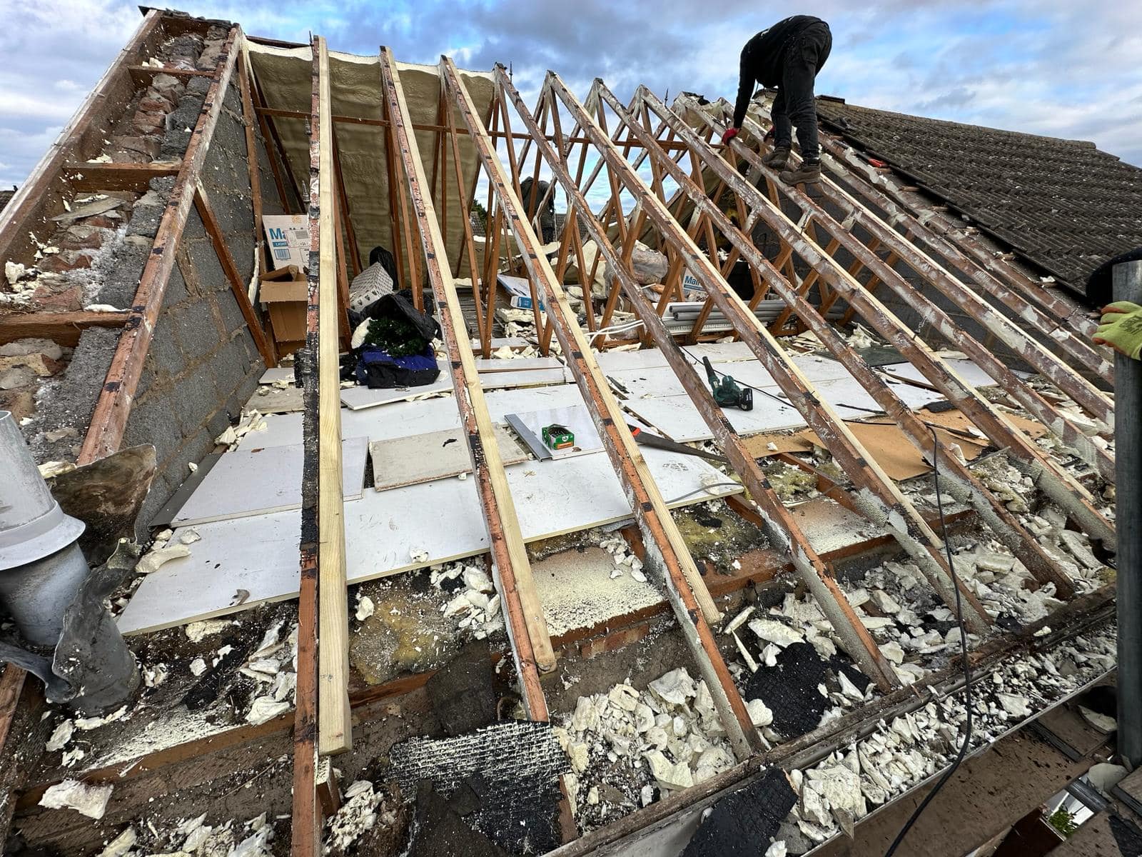 Professional roofers working on a property in London - KS Roof Master