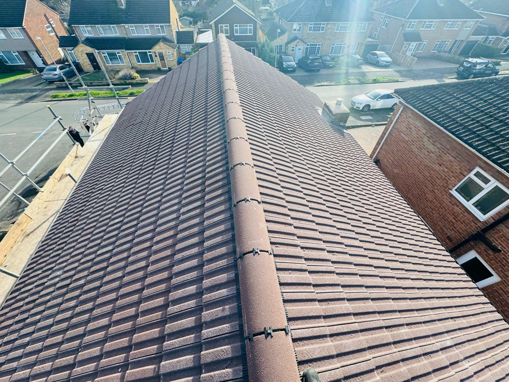 Professional roofers working on a property in London - KS Roof Master