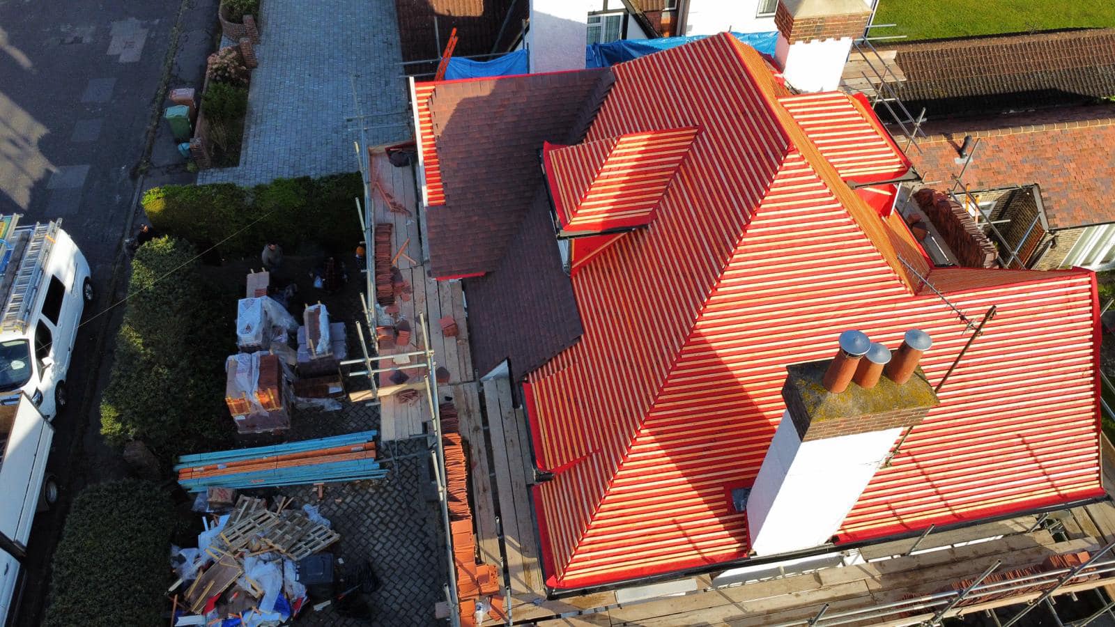 Professional roofers working on a property in London - KS Roof Master