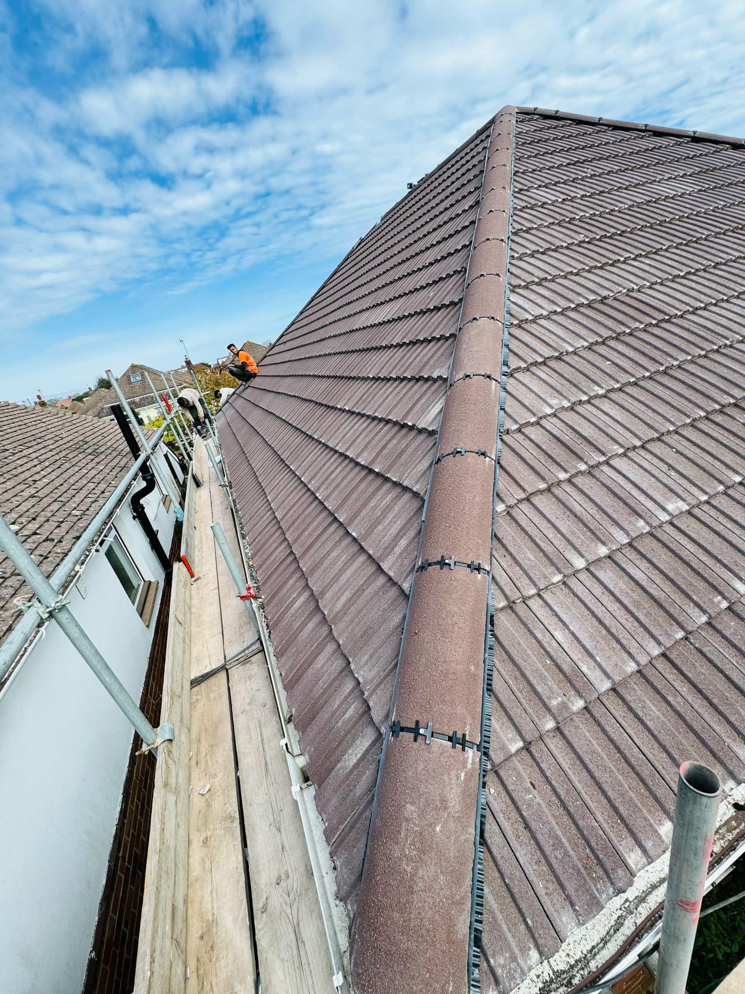Professional roofers working on a property in London - KS Roof Master