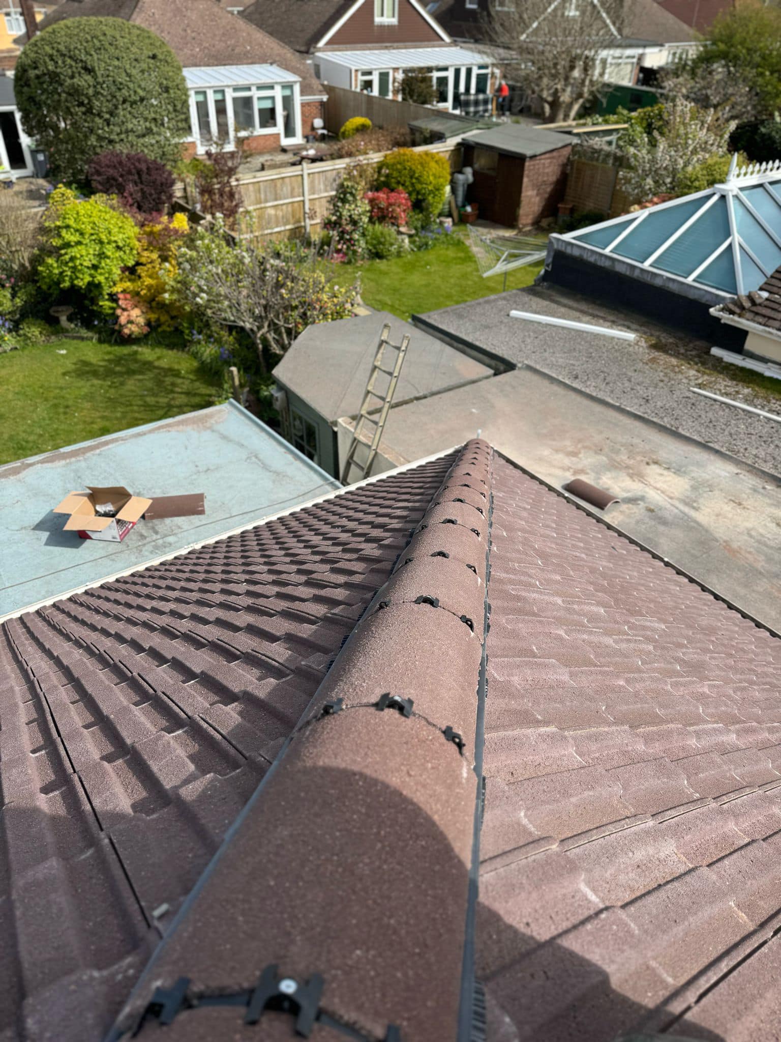 Professional roofers working on a property in London - KS Roof Master