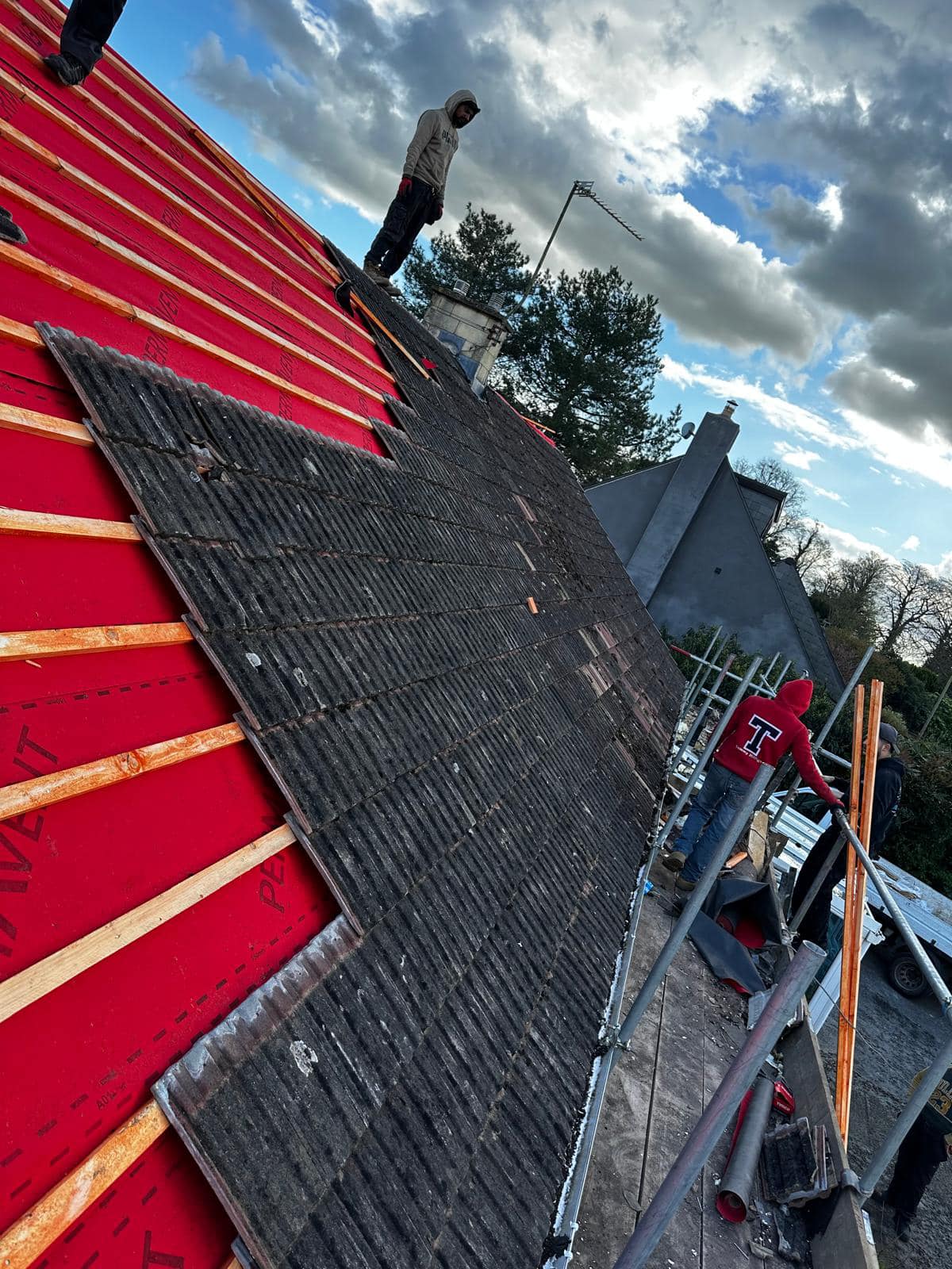 Professional roofers working on a property in London - KS Roof Master