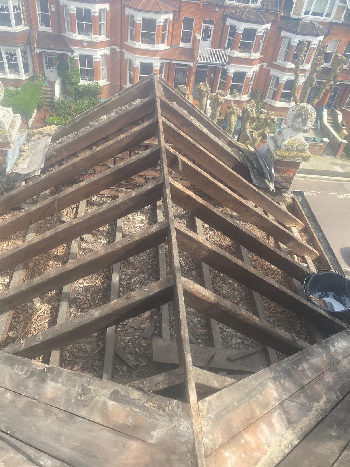 Professional roofers working on a property in London - KS Roof Master