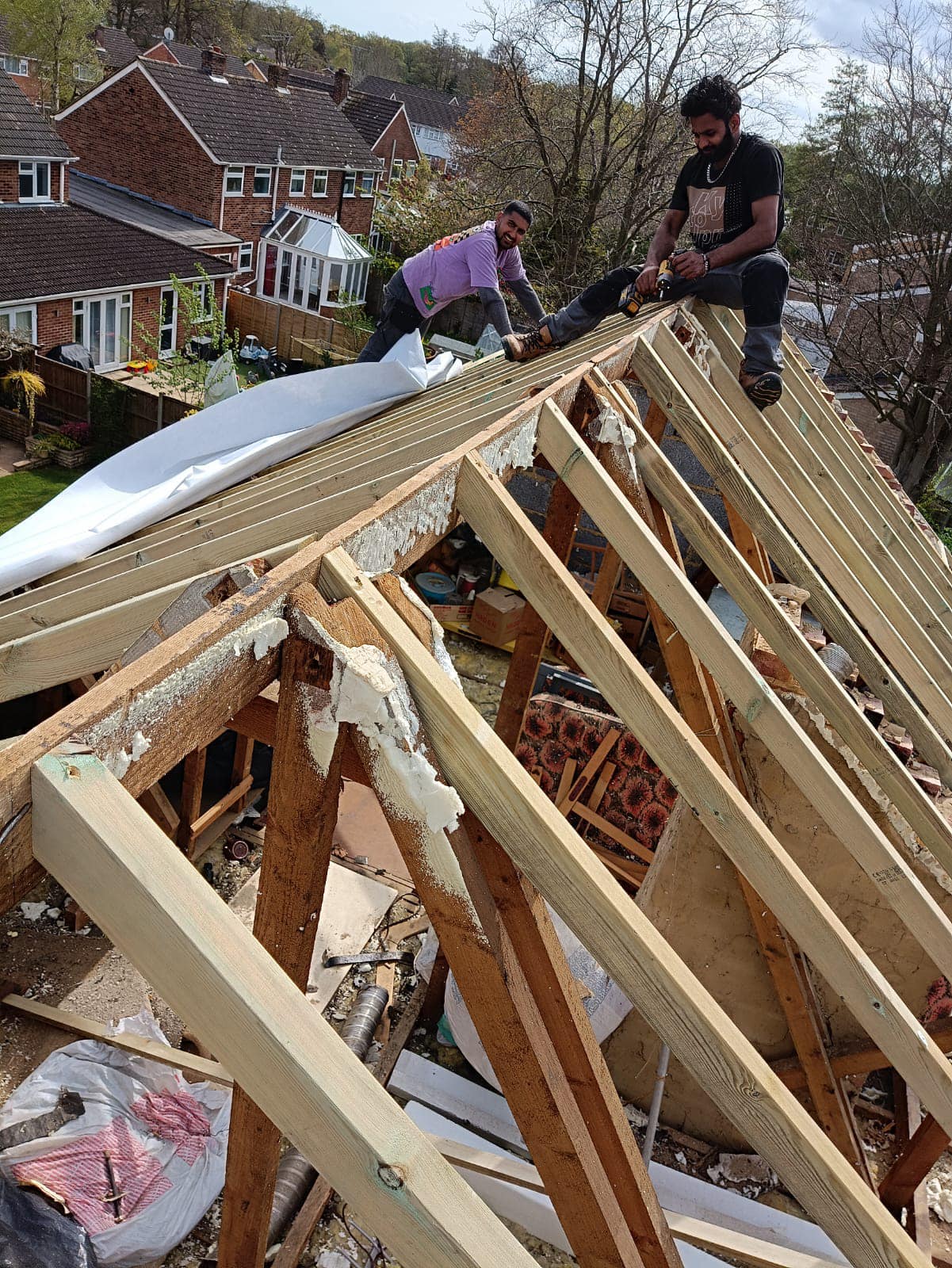 Professional roofers working on a property in London - KS Roof Master