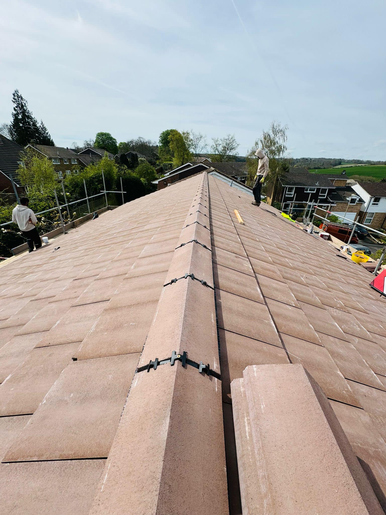 Professional roofers working on a property in London - KS Roof Master