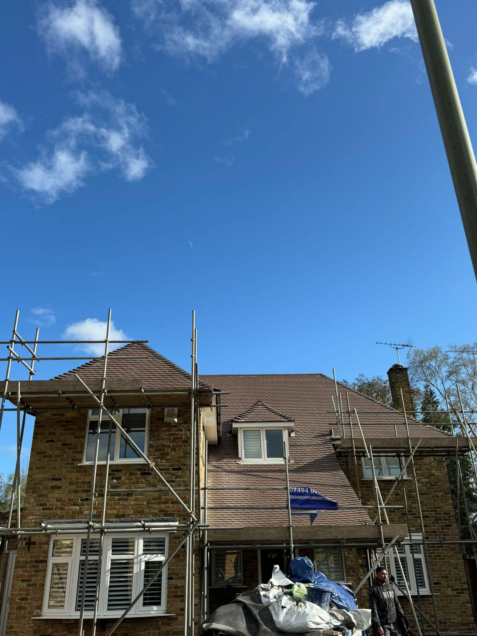 Professional roofers working on a property in London - KS Roof Master