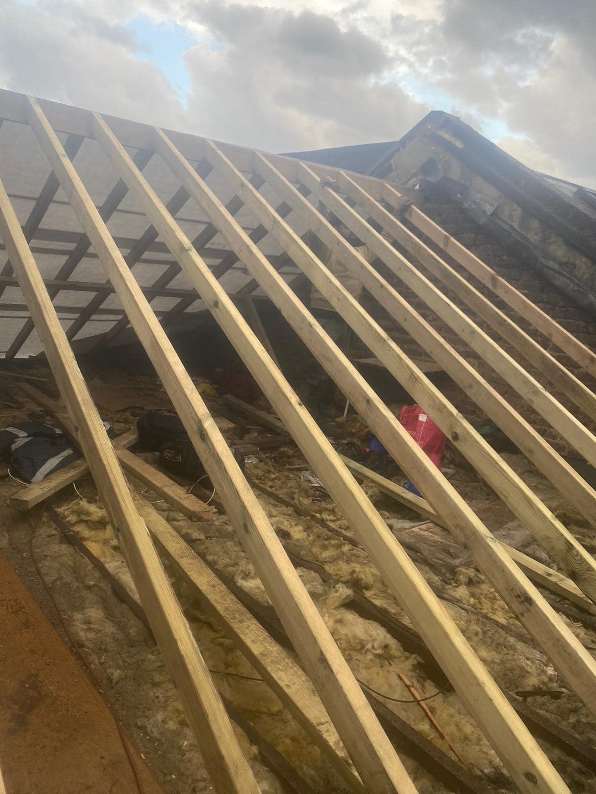 Professional roofers working on a property in London - KS Roof Master