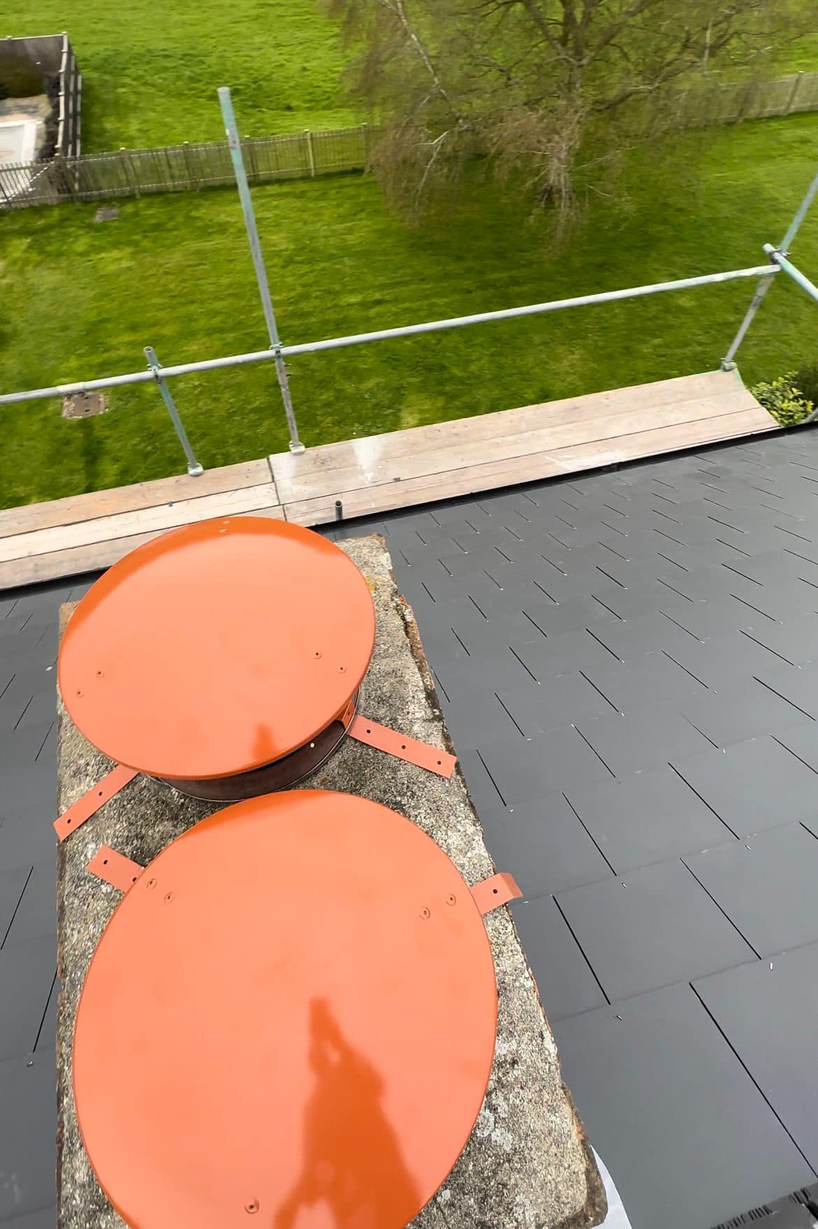 Professional roofers working on a property in London - KS Roof Master