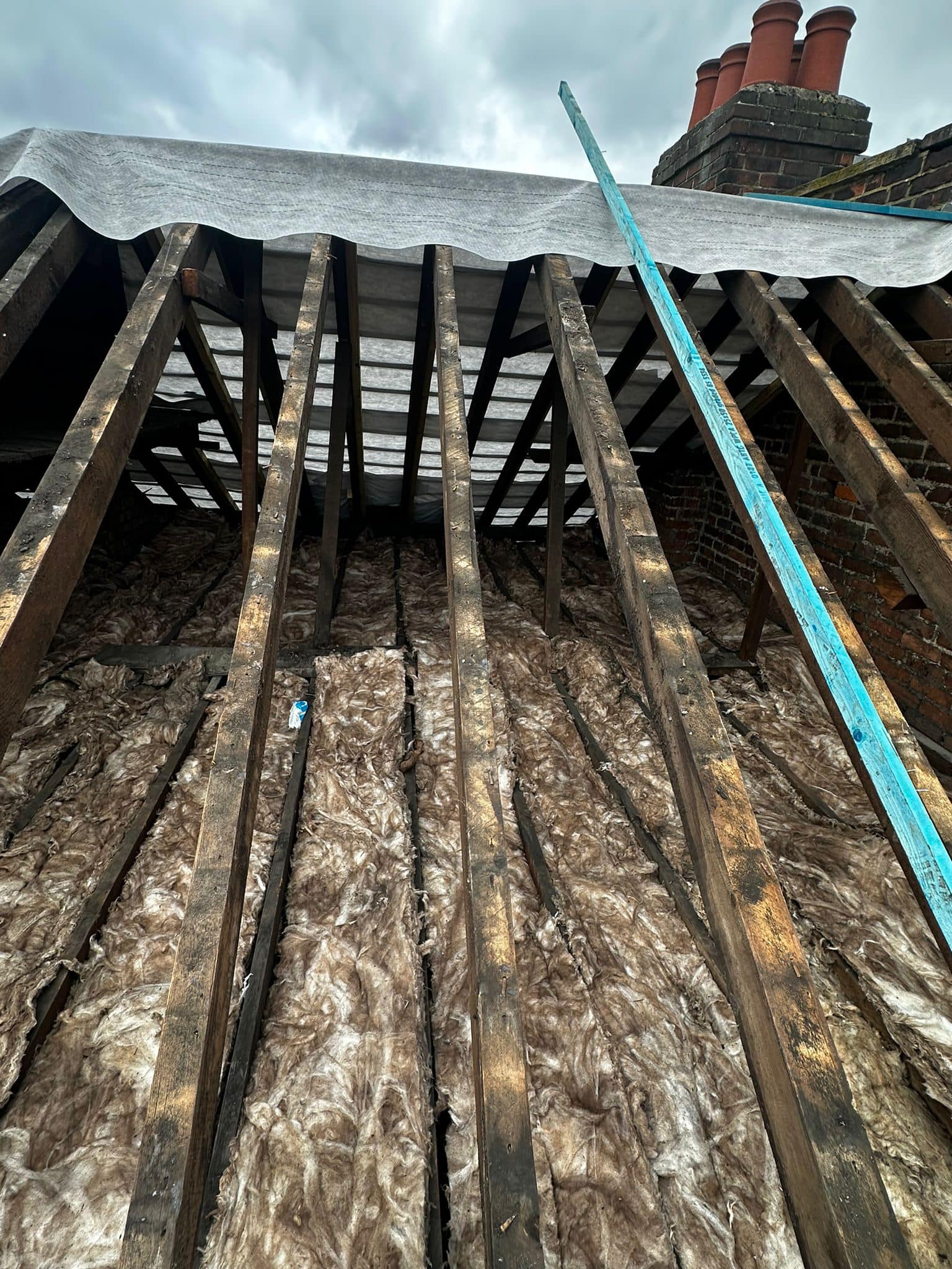 Professional roofers working on a property in London - KS Roof Master