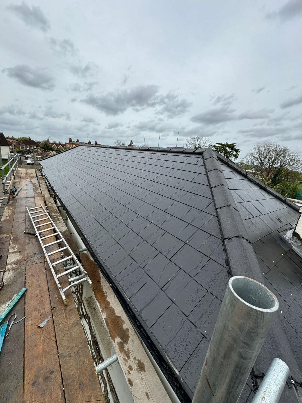 Professional roofers working on a property in London - KS Roof Master