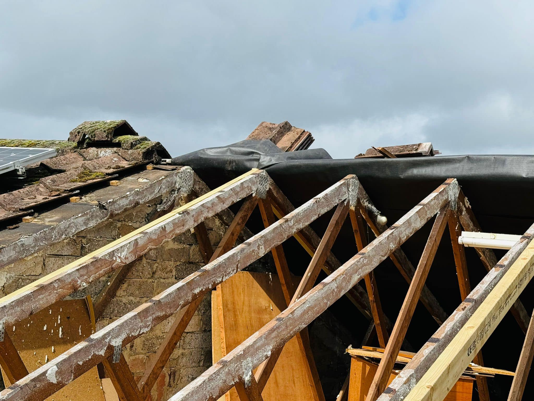 Professional roofers working on a property in London - KS Roof Master