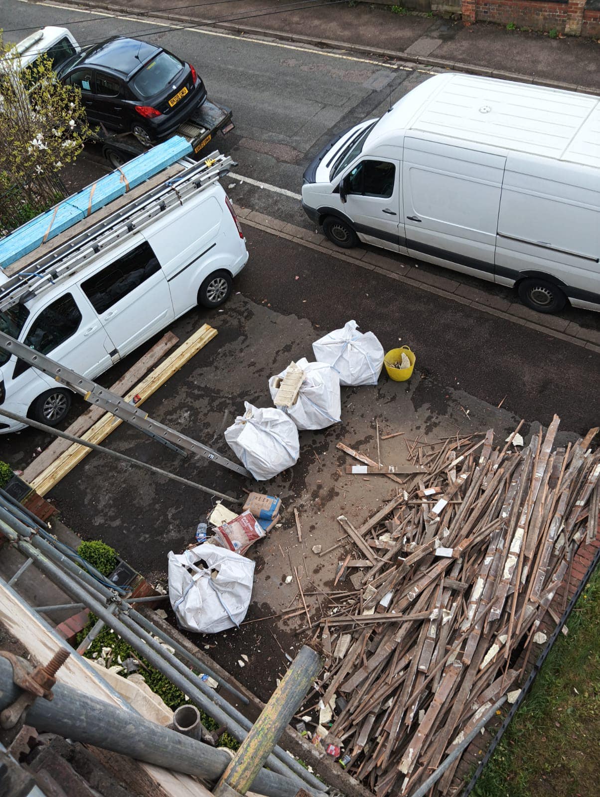 Professional roofers working on a property in London - KS Roof Master
