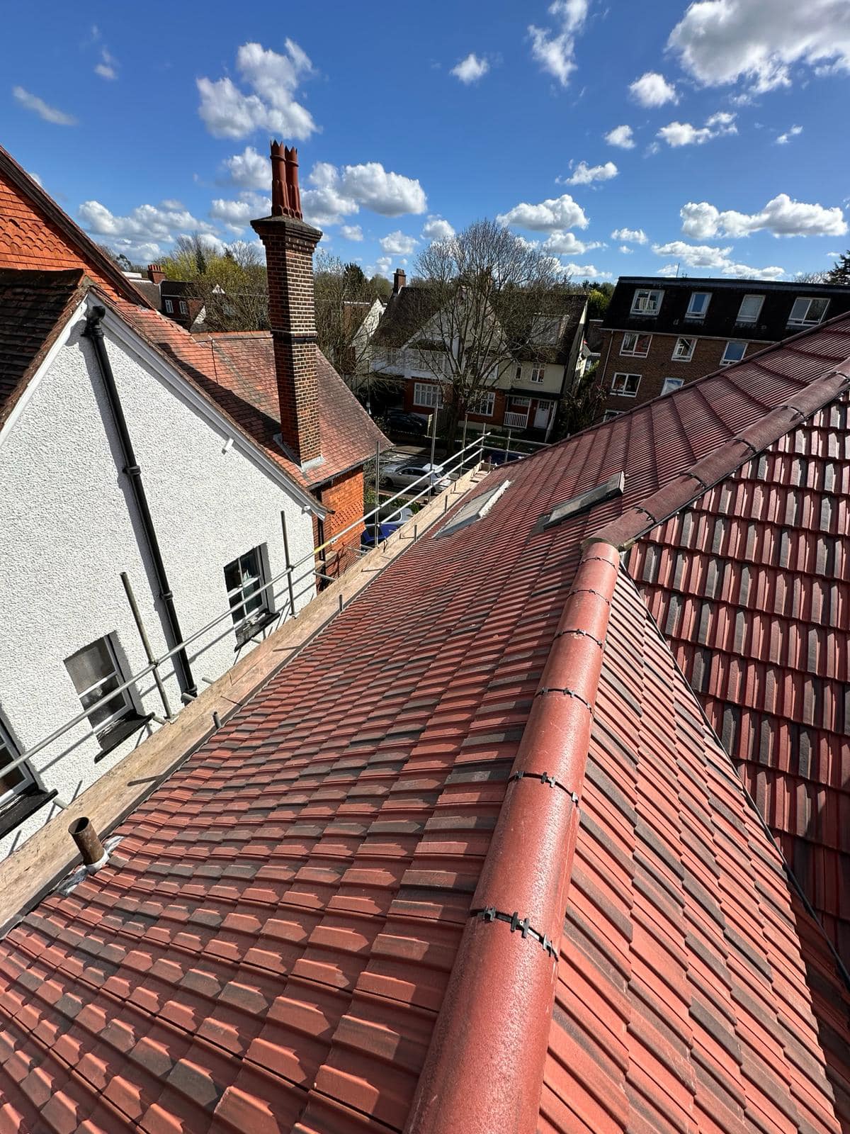 Professional roofers working on a property in London - KS Roof Master