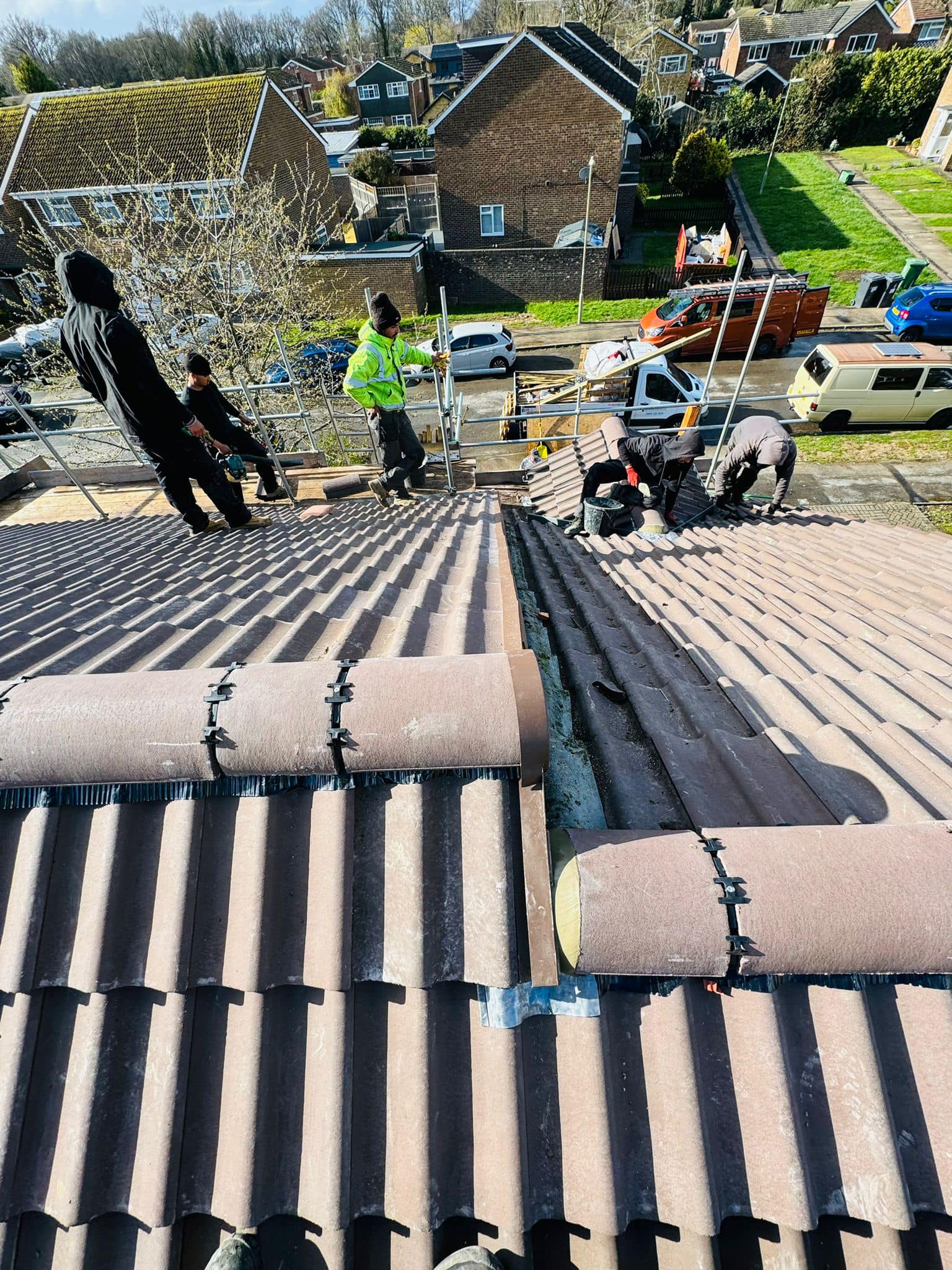 Professional roofers working on a property in London - KS Roof Master