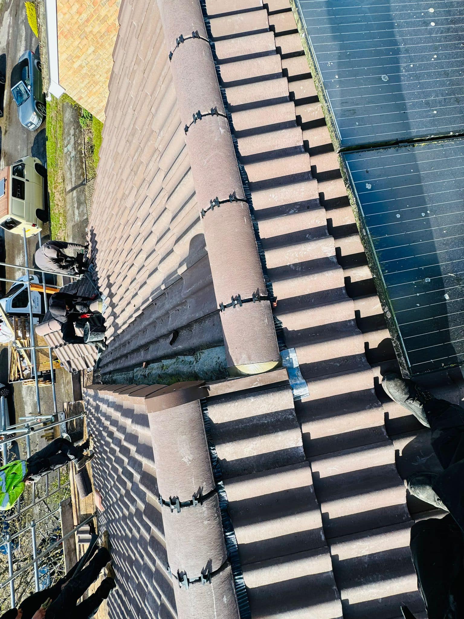 Professional roofers working on a property in London - KS Roof Master