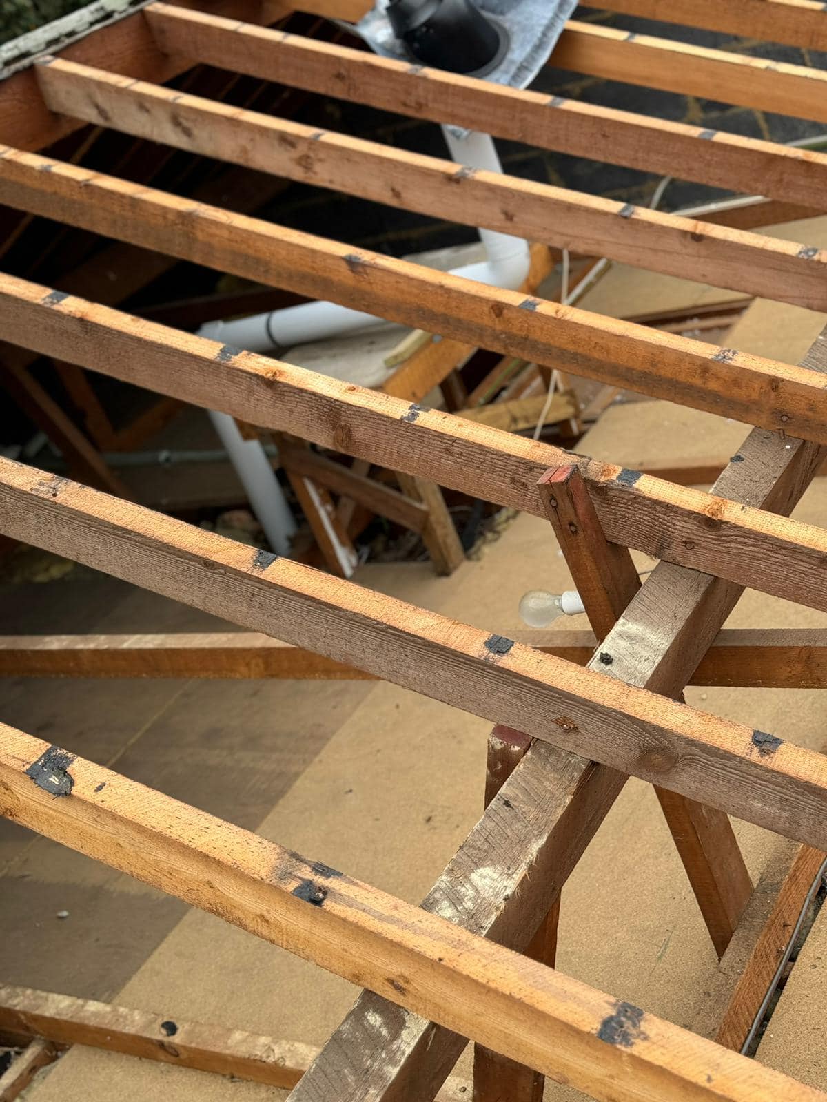 Professional roofers working on a property in London - KS Roof Master