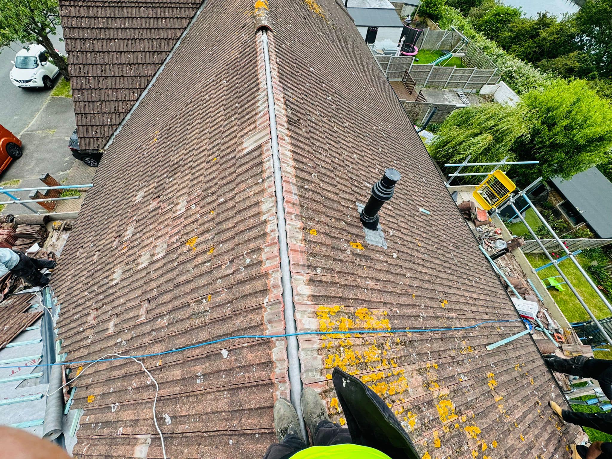 Professional roofers working on a property in London - KS Roof Master