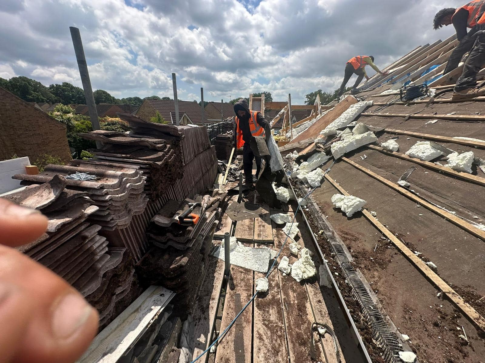 Professional roofers working on a property in London - KS Roof Master
