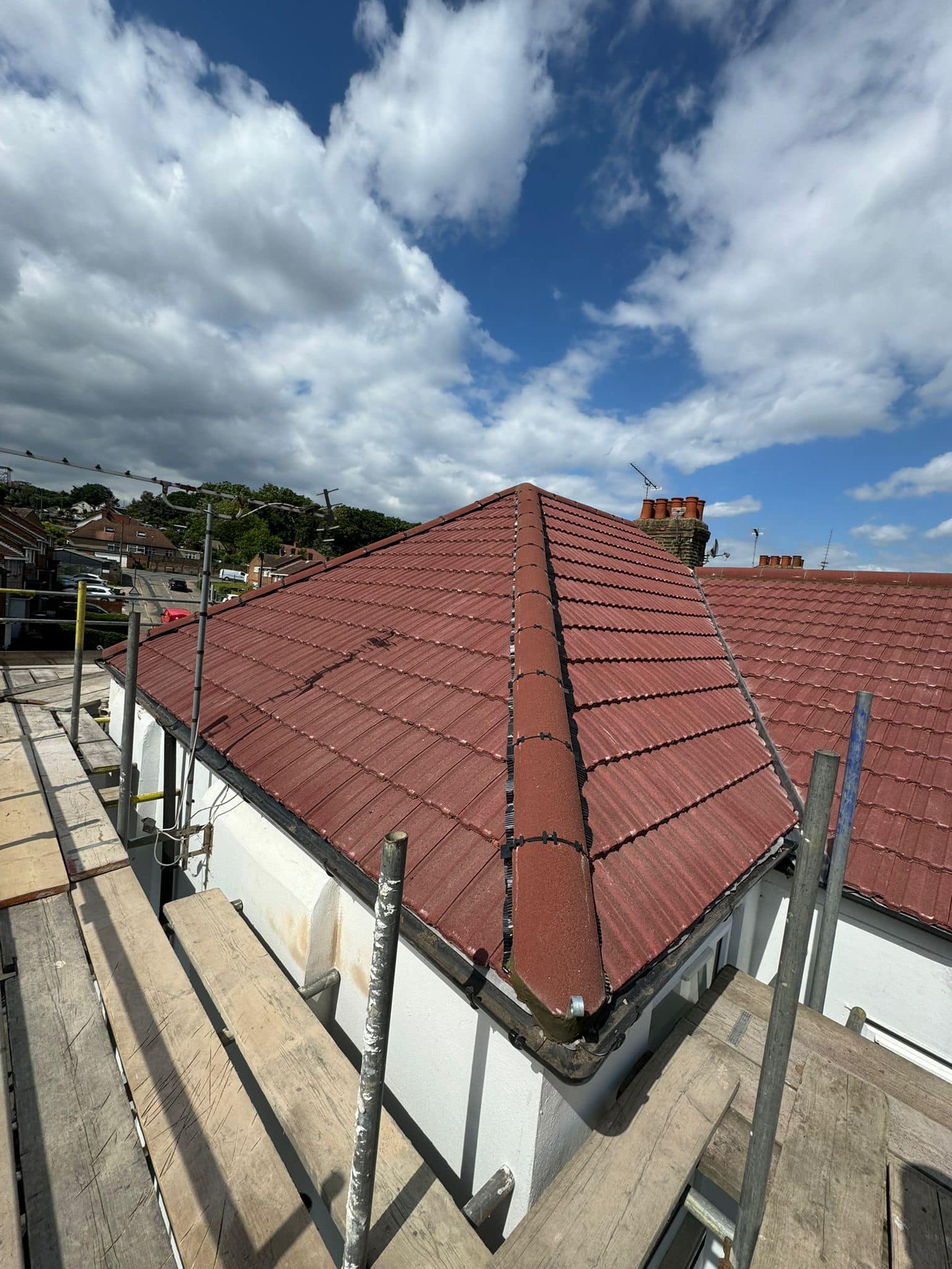 Professional roofers working on a property in London - KS Roof Master
