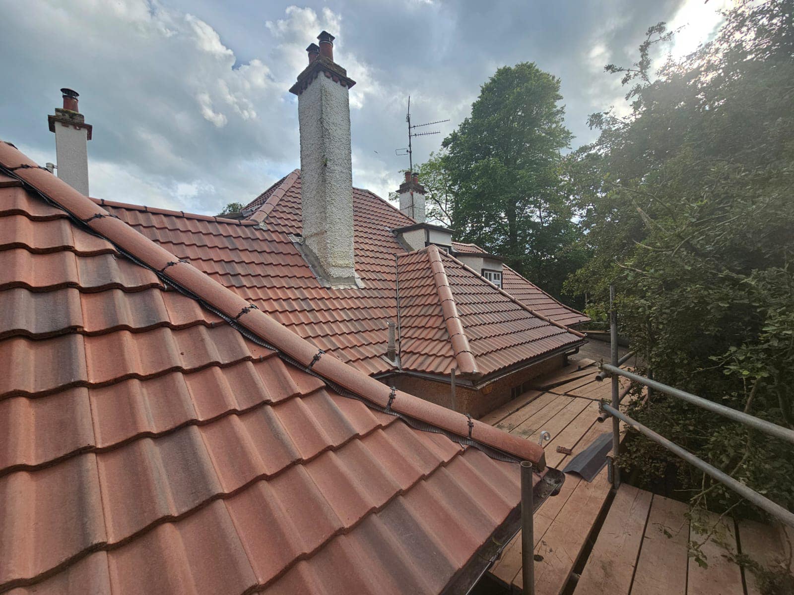 Professional roofers working on a property in London - KS Roof Master