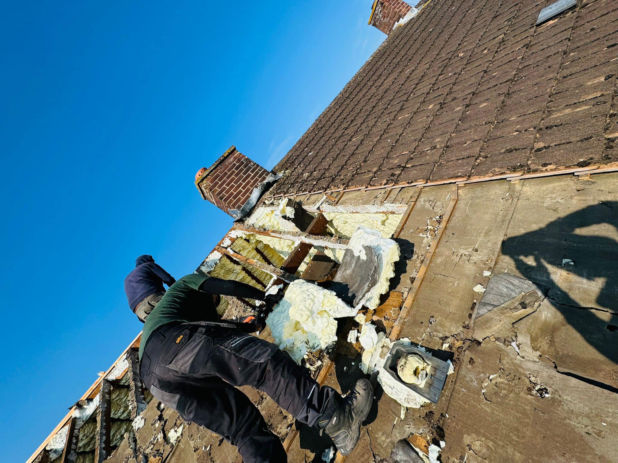 Professional roofers working on a property in London - KS Roof Master
