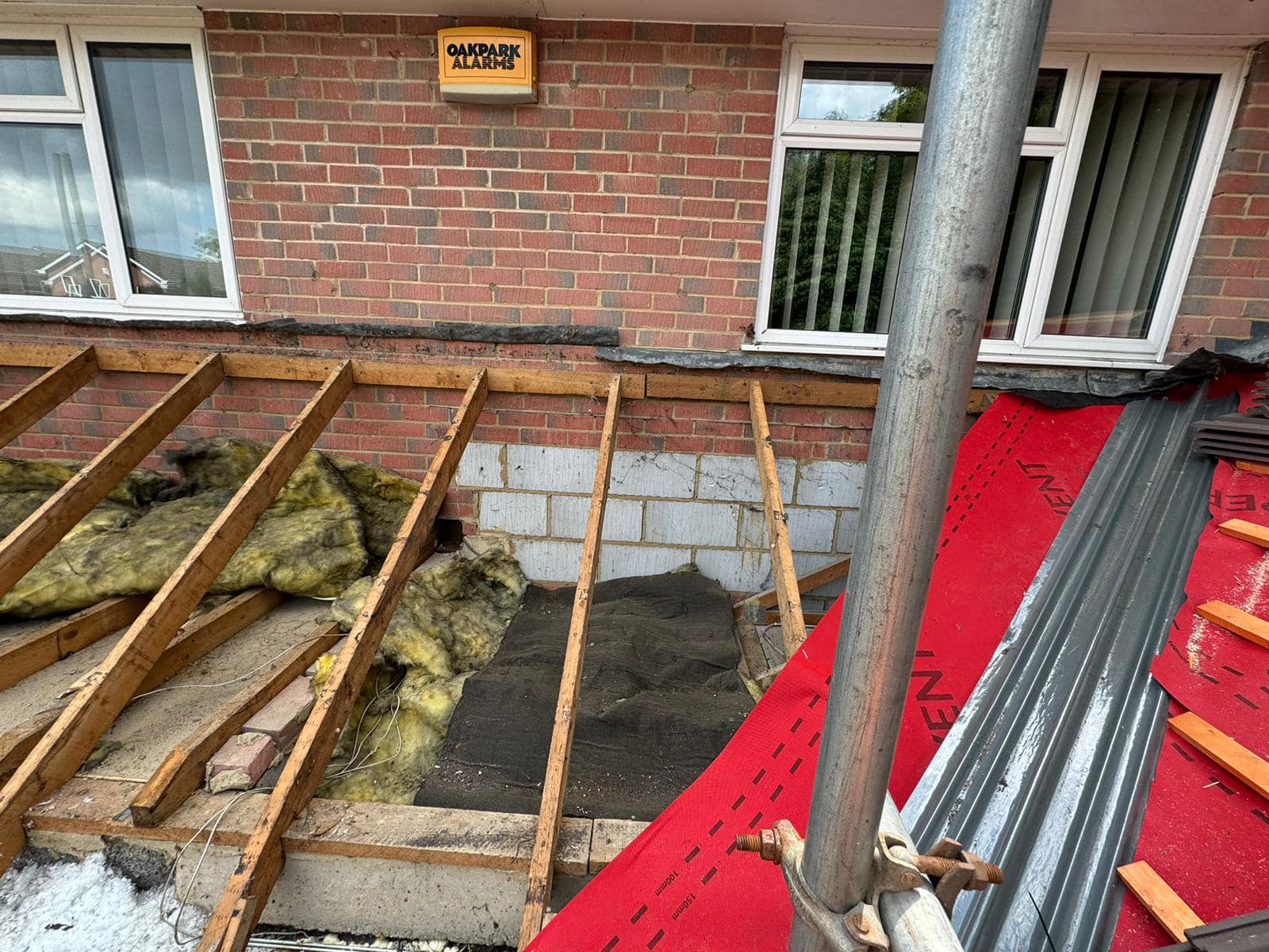 Professional roofers working on a property in London - KS Roof Master