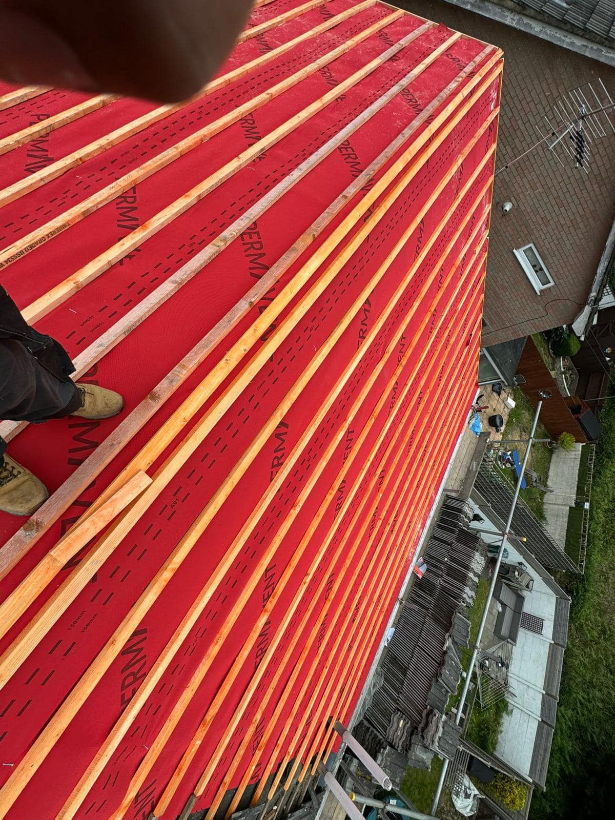 Professional roofers working on a property in London - KS Roof Master