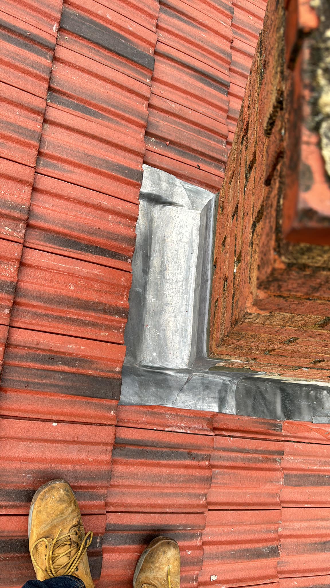 Professional roofers working on a property in London - KS Roof Master
