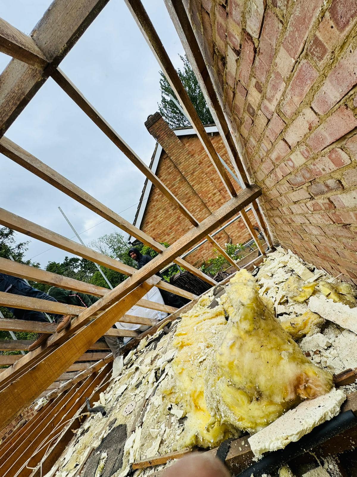 Professional roofers working on a property in London - KS Roof Master