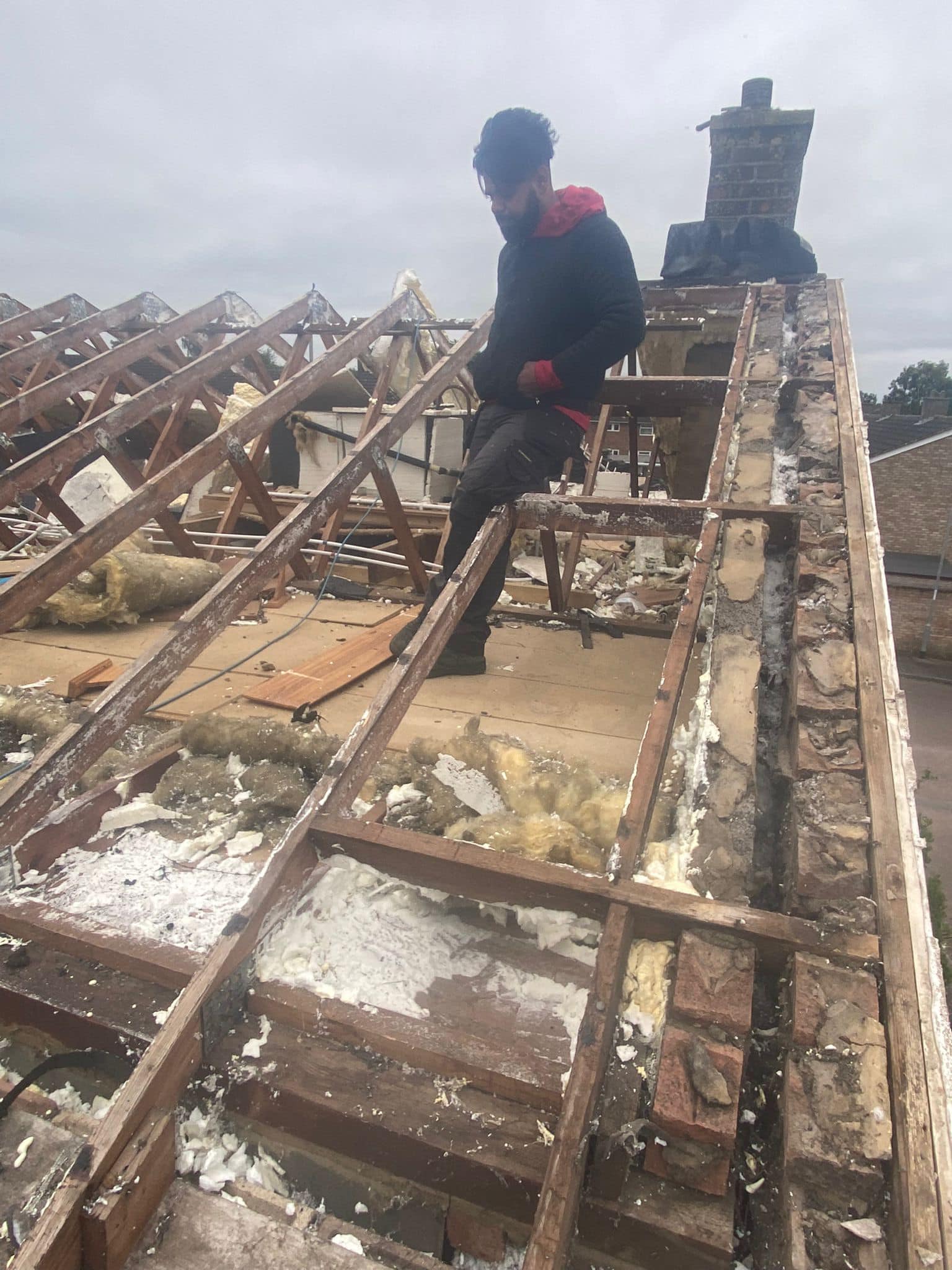 Professional roofers working on a property in London - KS Roof Master