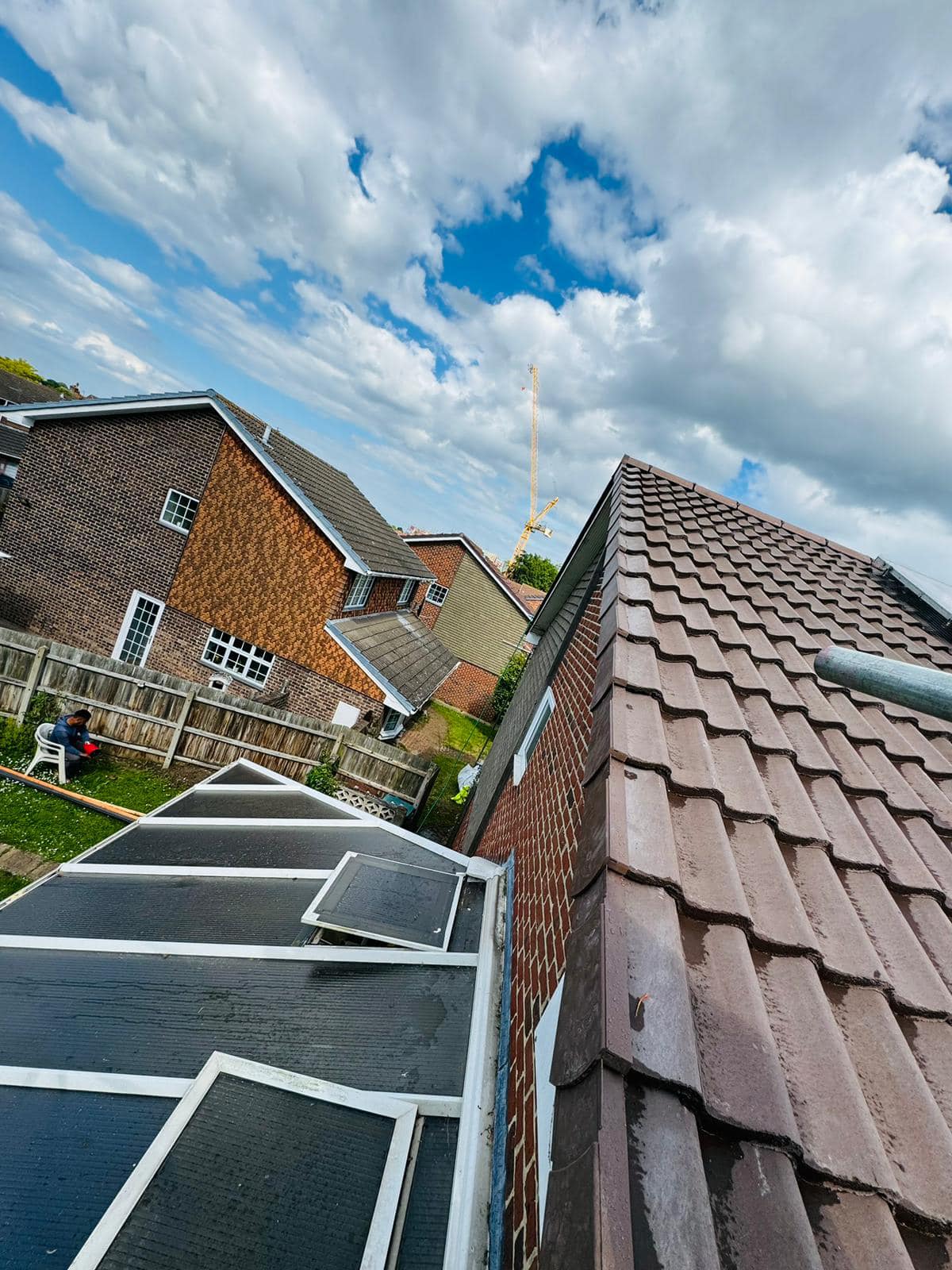 Professional roofers working on a property in London - KS Roof Master