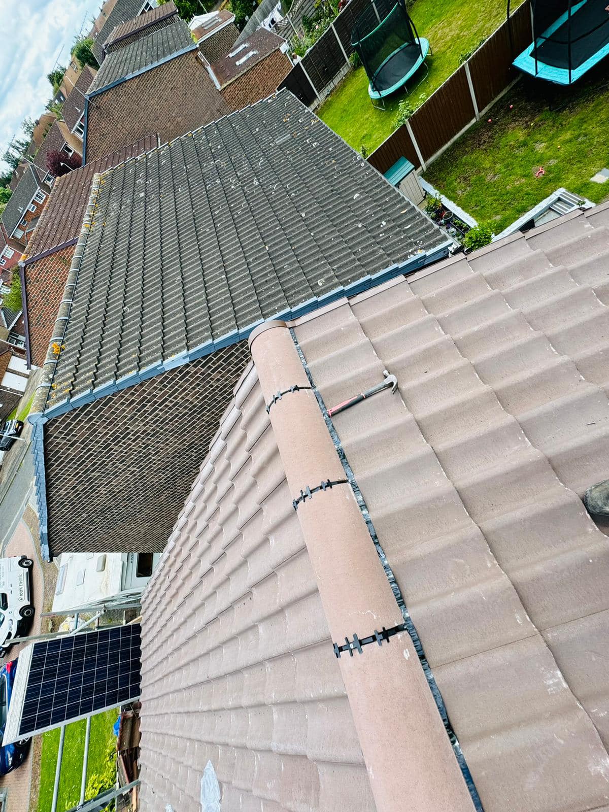 Professional roofers working on a property in London - KS Roof Master