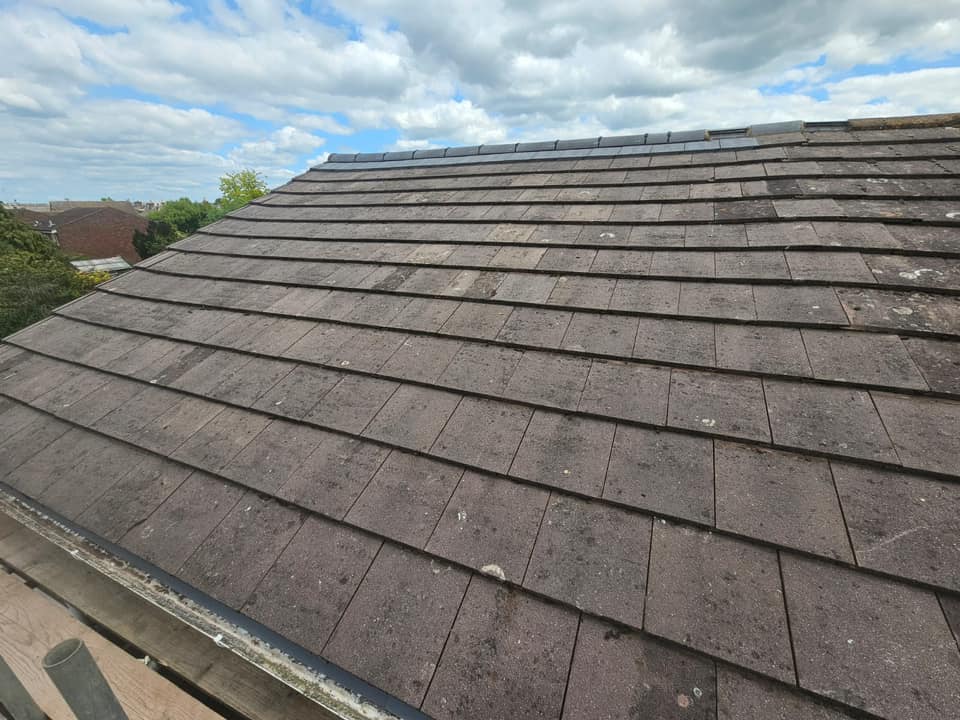 Professional roofers working on a property in London - KS Roof Master
