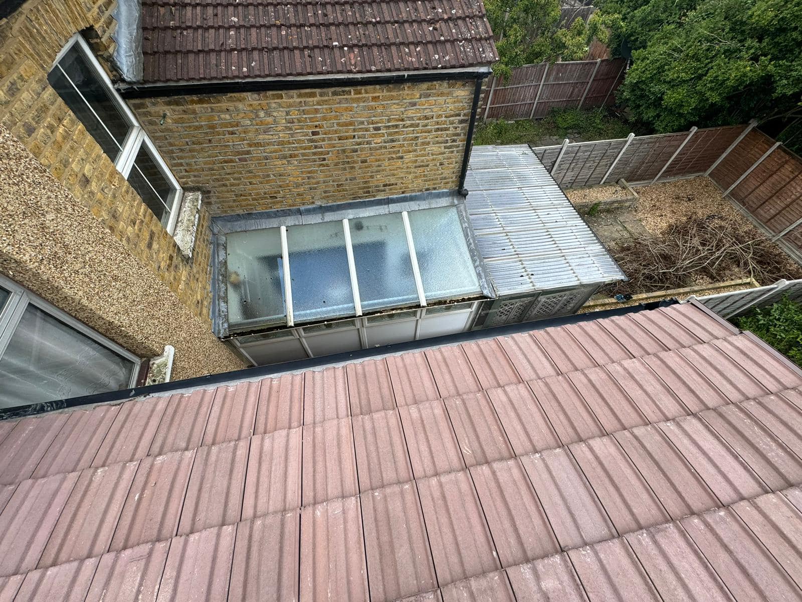 Professional roofers working on a property in London - KS Roof Master