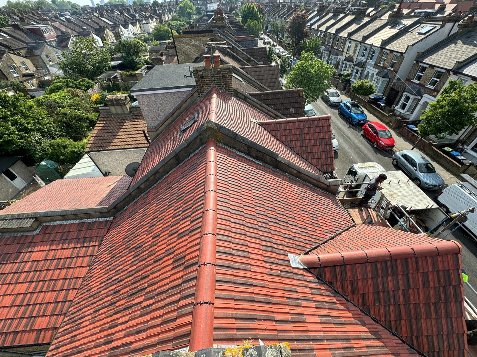 Professional roofers working on a property in London - KS Roof Master