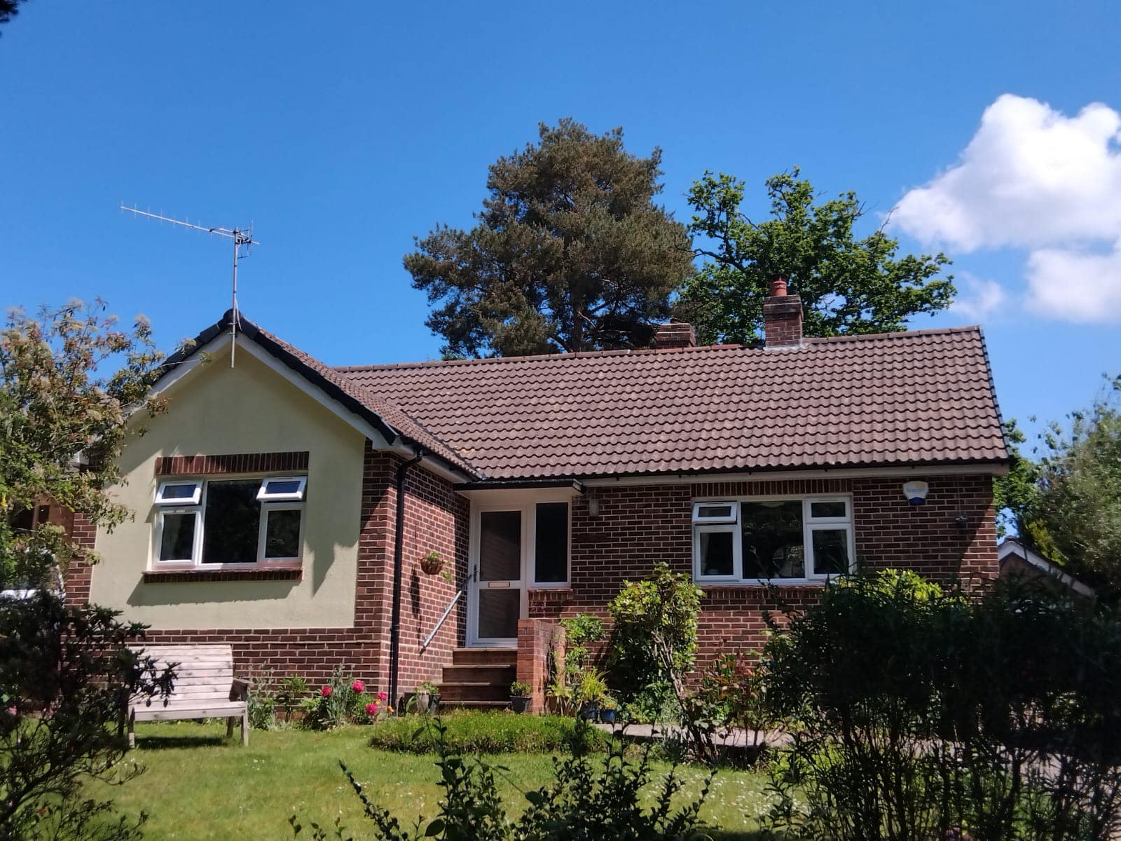 Professional roofers working on a property in London - KS Roof Master