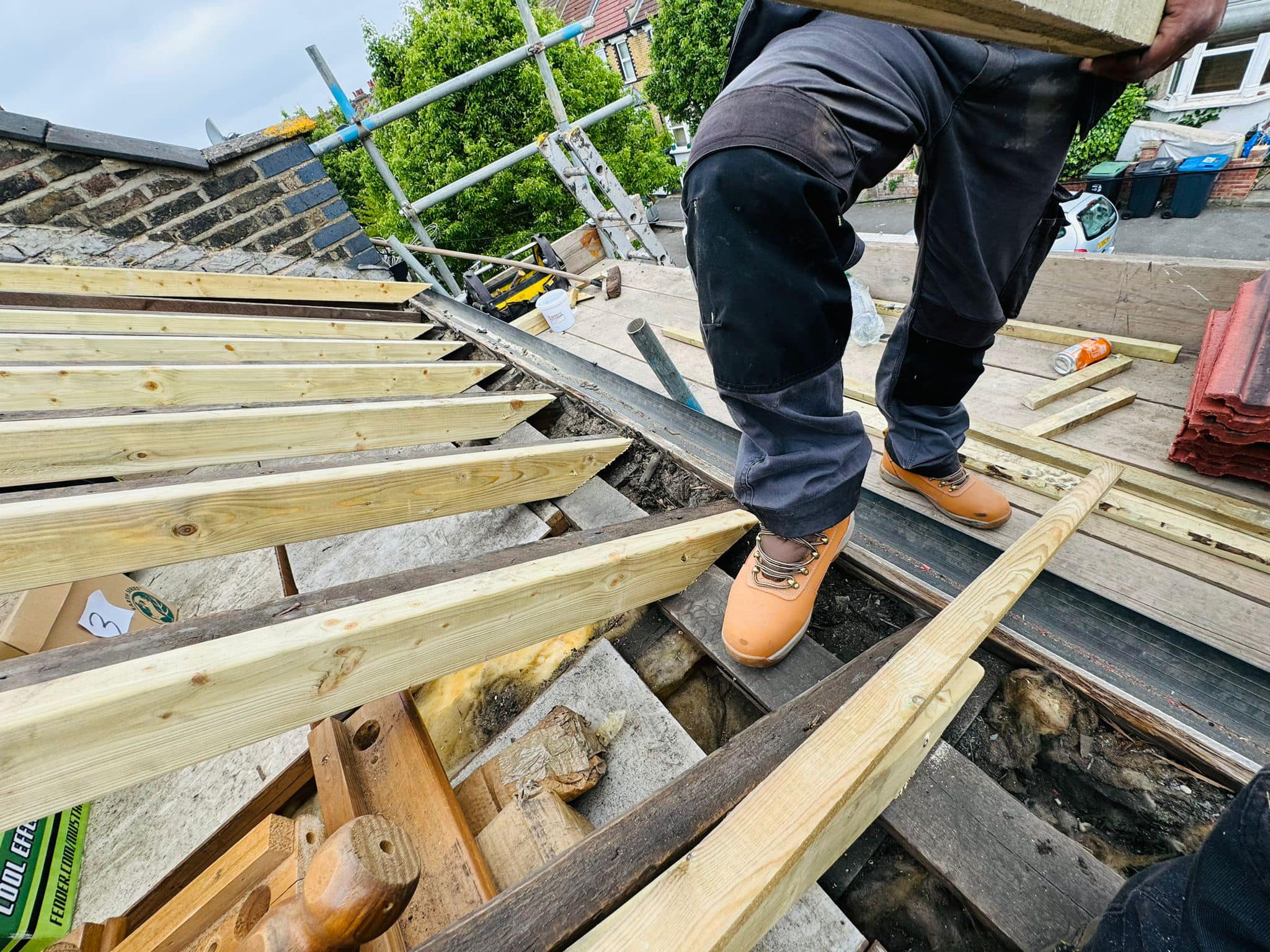 Professional roofers working on a property in London - KS Roof Master