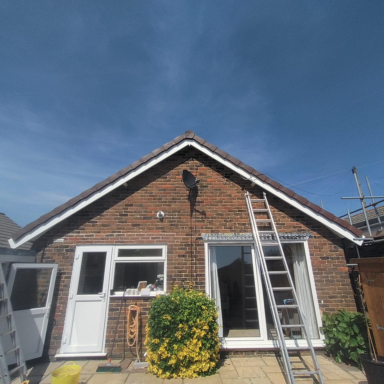 Professional roofers working on a property in London - KS Roof Master