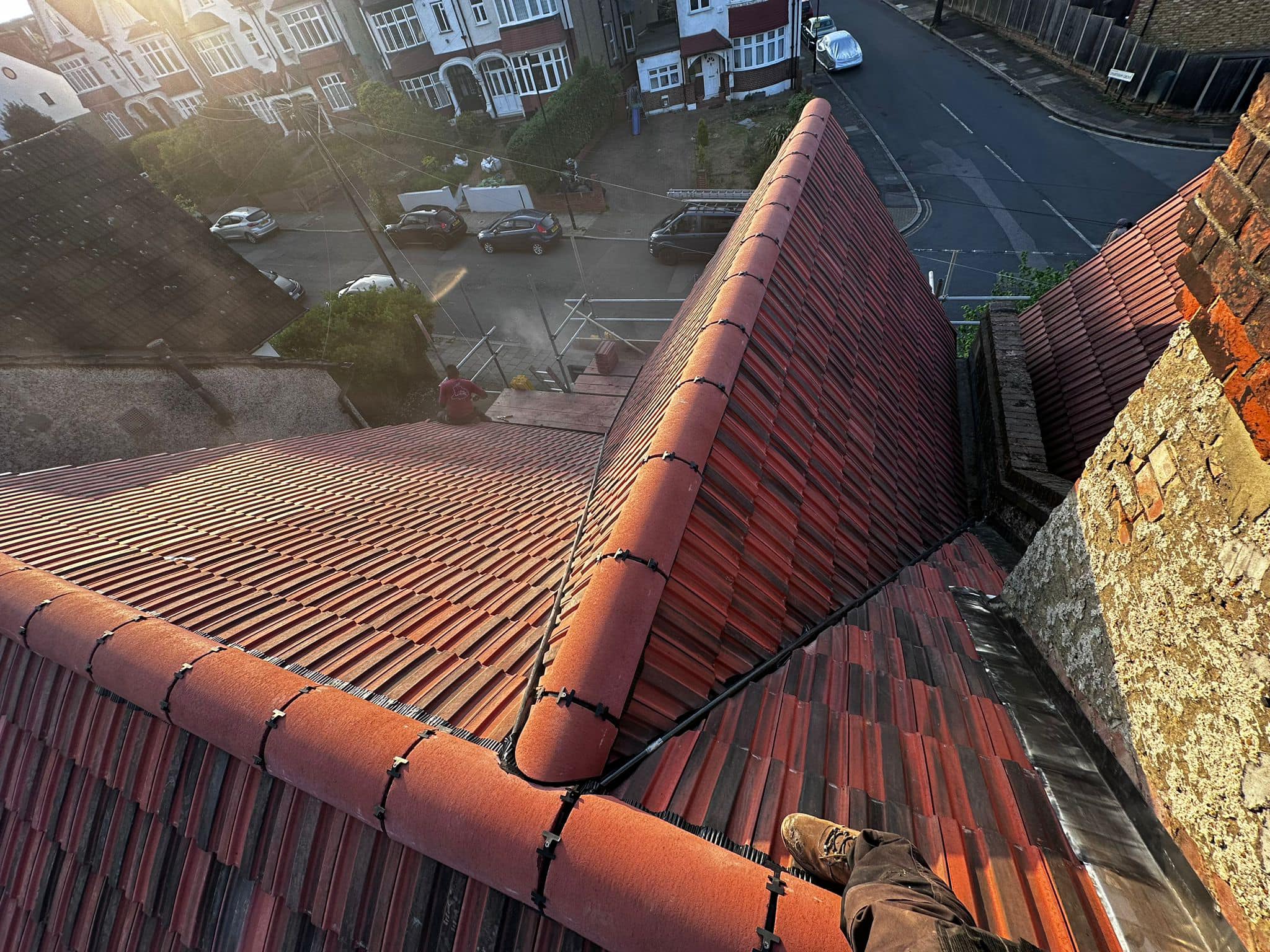 Professional roofers working on a property in London - KS Roof Master