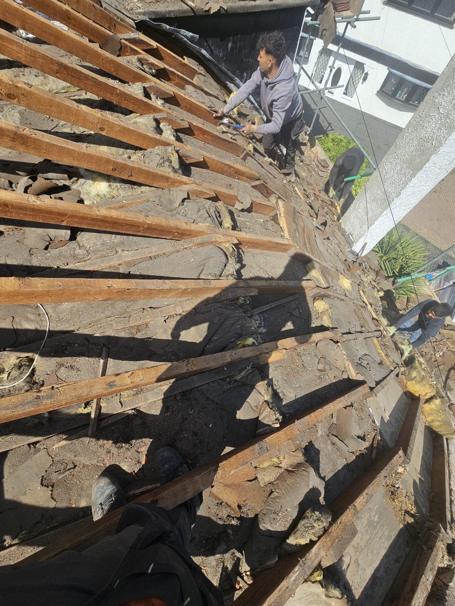 Professional roofers working on a property in London - KS Roof Master