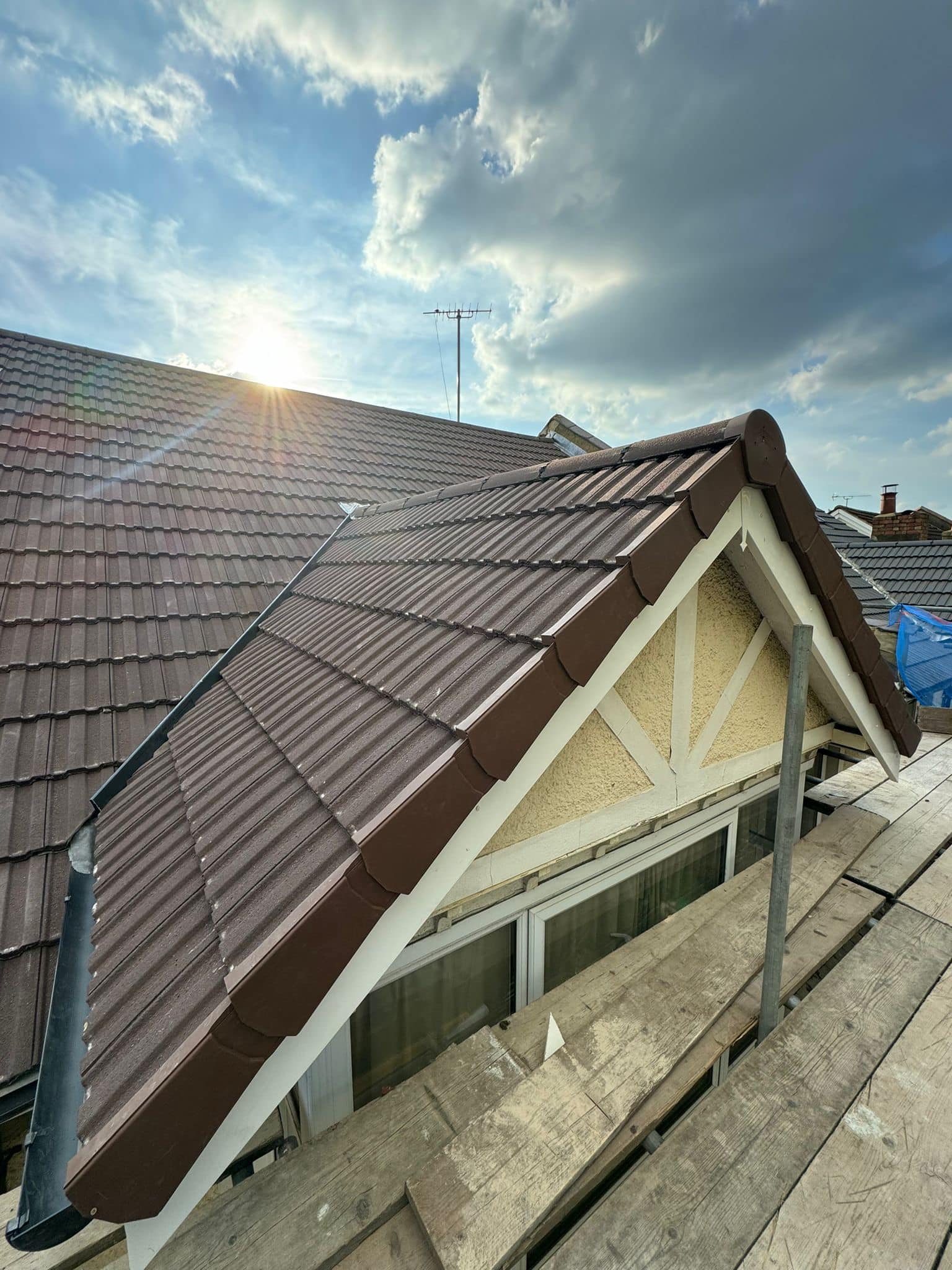 Professional roofers working on a property in London - KS Roof Master