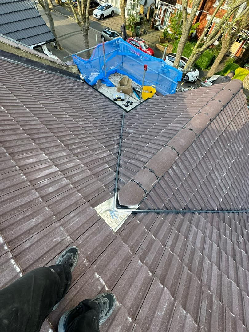 Professional roofers working on a property in London - KS Roof Master