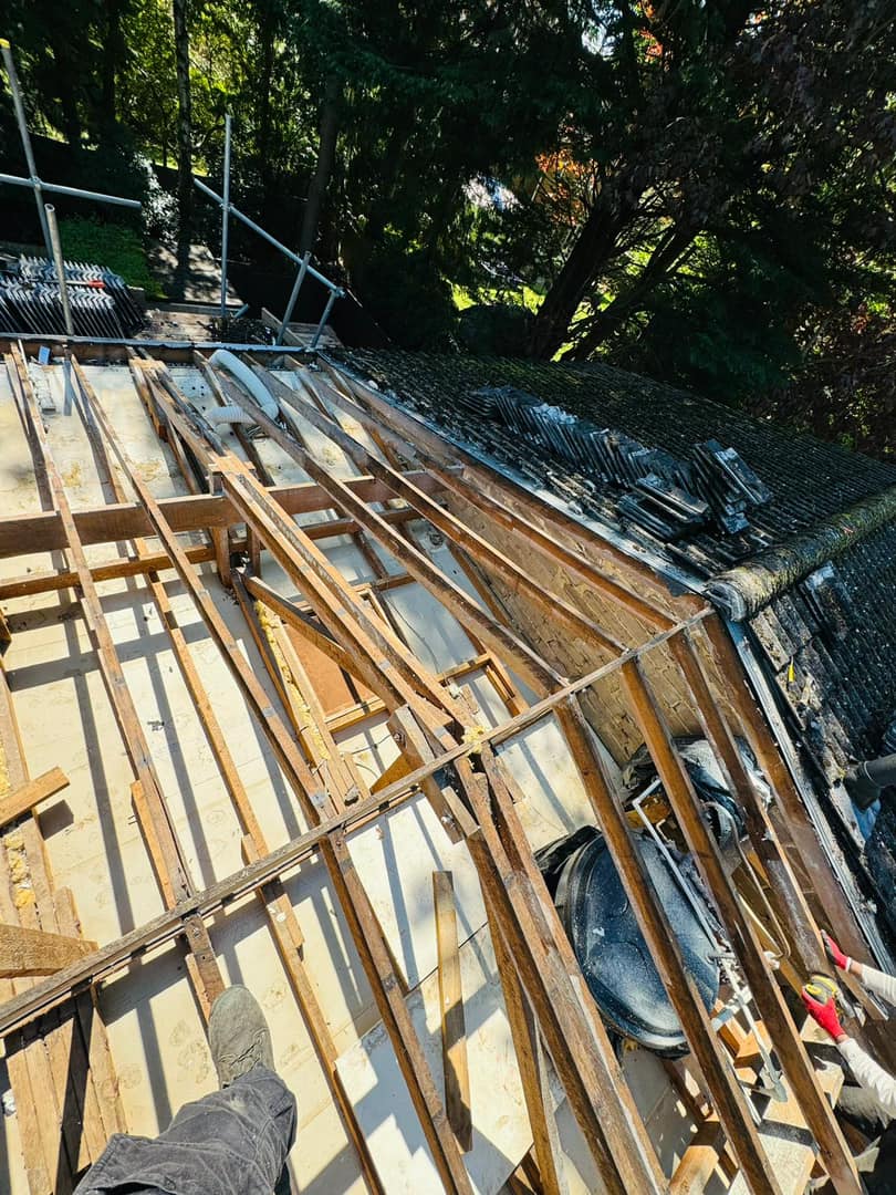 Professional roofers working on a property in London - KS Roof Master