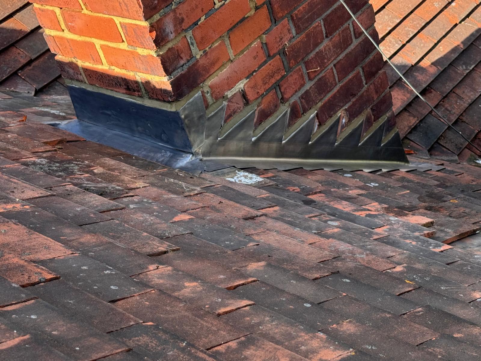 Professional roofers working on a property in London - KS Roof Master