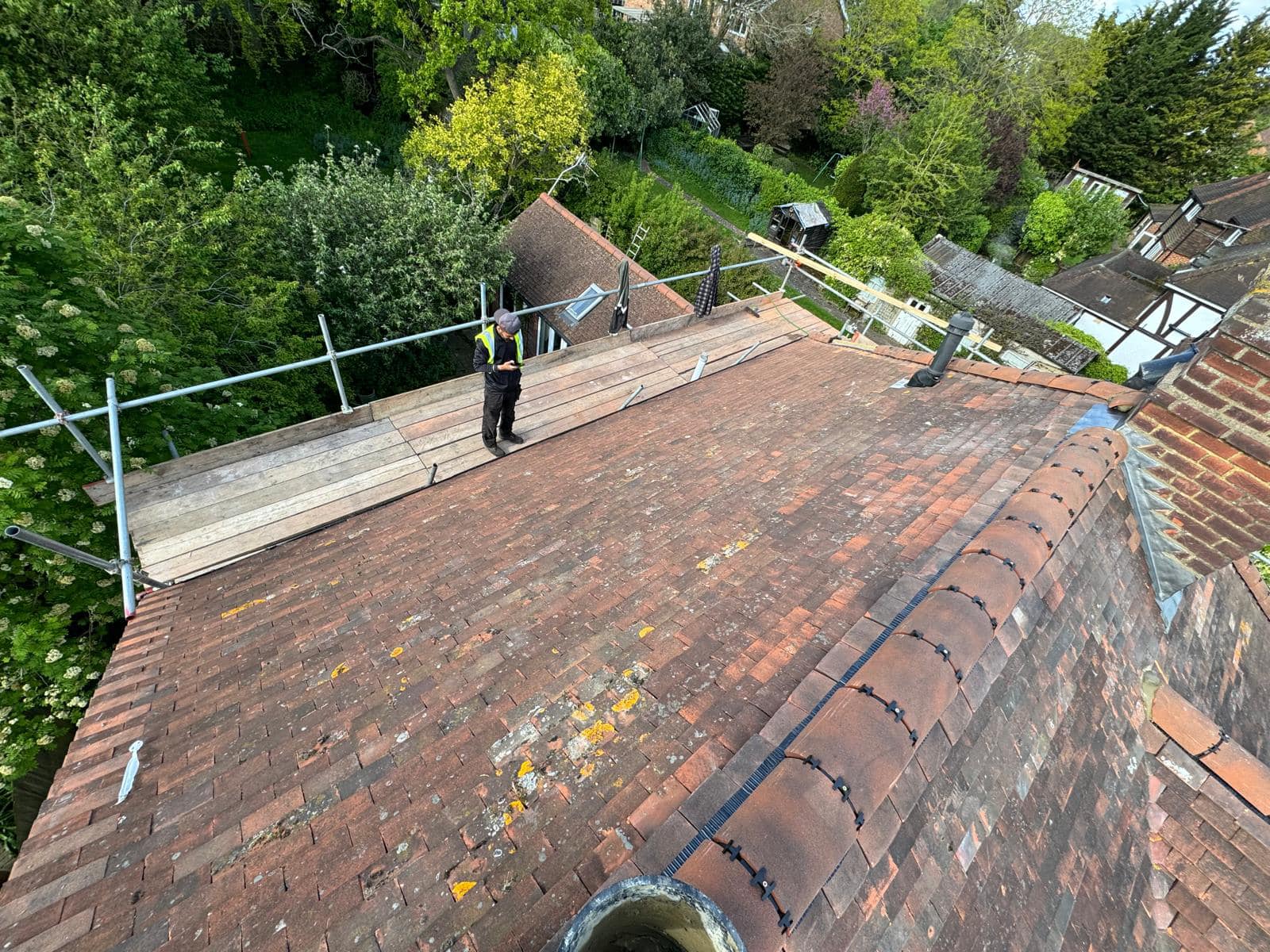 Professional roofers working on a property in London - KS Roof Master
